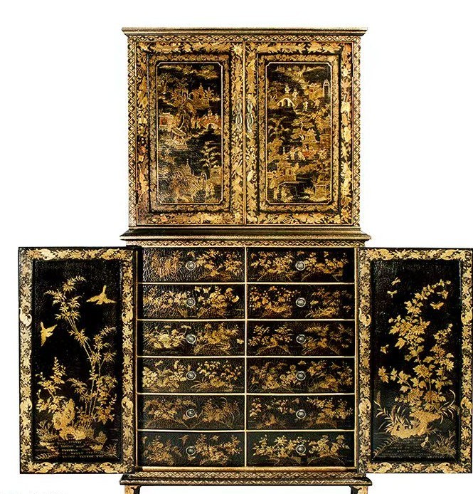 Gold-traced lacquer cabinet on stand with painted door and drawer panels