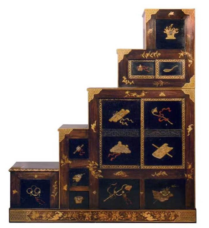 Gold and silver-traced lacquer staircase-form cabinet